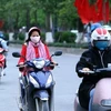 Người dân Hà Nội tham gia giao thông trên đường Tân Mai, thủ đô Hà Nội, sáng 8/12. (Ảnh: Danh Lam/TTXVN)