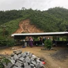 Hiện trường vụ sạt lở núi tại thông Khánh Thành Nam, xã Suối Cát, huyện Cam Lâm. (Ảnh: Phan /TTXVN)
