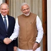 Thủ tướng Ấn Độ Narendra Modi (phải) trong một cuộc gặp Tổng thống Nga Vladimir Putin. (Ảnh: AFP/TTXVN)