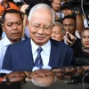 Cựu Thủ tướng Najib Razak rời tòa án ở Kuala Lumpur, Malaysia, ngày 12/12/2018. (Ảnh: AFP/TTXVN)