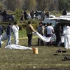 Chuyển thi thể nạn nhân trong vụ nổ đường ống dẫn nhiên liệu ở Hidalgo, Mexico ngày 20/1 vừa qua. (Ảnh: AFP/TTXVN)