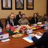 Quyền Bộ trưởng Quốc phòng Mỹ Patrick Shanahan (thứ 2, trái) trong cuộc gặp Cố vấn An ninh quốc gia Afghanistan Hamdullah Mohib (phải) tại Kabul ngày 11/2. (Ảnh: AFP/TTXVN)