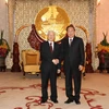 Tổng Bí thư, Chủ tịch nước Nguyễn Phú Trọng và nguyên Tổng Bí thư, Chủ tịch nước Lào Choummaly Sayasone. (Ảnh: Trí Dũng/TTXVN)