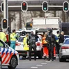 Cảnh sát điều tra tại hiện trường vụ xả súng ở Utrecht của Hà Lan, ngày 18/3. (Ảnh: AFP/TTXVN)