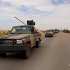 Đoàn xe quân sự thuộc Lực lượng tự xưng Quân đội quốc gia Libya hướng về miền Đông Libya và Tripoli ngày 3/4 vừa qua. (Ảnh: AFP/TTXVN)