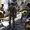 Lực lượng an ninh điều tra tại hiện trường vụ nổ ở nhà thờ Zion, khu vực Batticaloa, Sri Lanka, ngày 21/4. (Ảnh: AFP/TTXVN)
