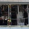 Cảnh sát điều tra tại hiện trường vụ nổ ở khách sạn Shangri-La ở thủ đô Colombo của Sri Lanka, ngày 21/4. (Ảnh: AFP/TTXVN)