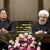 Tổng thống Iran Hassan Rouhani và Thủ tướng Pakistan Imran Khan. (Nguồn: AFP)
