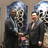 Phó Thủ tướng, Bộ trưởng Ngoại giao Phạm Bình Minh gặp Chánh văn phòng Tổng thống Liberia Nathaniel F.McGill. (Ảnh: TTXVN)