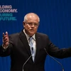 Thủ tướng Australia Scott Morrison (giữa) tại chiến dịch vận động tranh cử ở Melbourne ngày 12/5 vừa qua. (Ảnh: AFP/TTXVN)