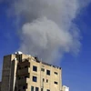 Khói bốc lên sau một cuộc không kích tại Sanaa của Yemen, ngày 16/5. (Ảnh: AFP/TTXVN)