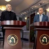 Ngoại trưởng Iraq Mohammed al-Hakim và người đồng cấp Iran Mohammad Javad Zarif. (Nguồn: Reuters)