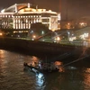 Lực lượng cứu hộ tìm kiếm các nạn nhân trong vụ va chạm và chìm tàu du lịch trên sông Danube ở thủ đô Budapest, Hungary tối 29/5 vừa qua. (Ảnh: AFP/TTXVN)
