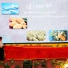 Lãnh đạo Bộ Nông nghiệp và Phát triển Nông thôn, tỉnh Sơn La, doanh nghiệp xuất khẩu và hợp tác xã có xoài xuất khẩu thực hiện nghi thức công bố sản phẩm xoài xuất khẩu năm 2019. (Ảnh: Nguyễn Cường/TTXVN)
