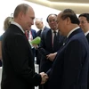 Thủ tướng Nguyễn Xuân Phúc gặp Tổng thống Nga Vladimir Putin. (Ảnh: TTXVN) 