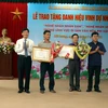 Truy tặng danh hiệu Nhà nước “Nghệ nhân nhân dân” cho 2 nghệ nhân Nguyễn Phú Đẹ và Phạm Văn Hiển (Văn Ngọc). (Ảnh: Mạnh Tú/ TTXVN)