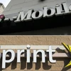 Biểu tượng Sprint và T-Mobile. (Ảnh: AFP/TTXVN)