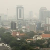 Không khí ô nhiễm bao trùm thủ đô Jakarta của Indonesia. (Ảnh: AFP/TTXVN)