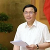 Phó Thủ tướng Vương Đình Huệ, Trưởng Ban Chỉ đạo phòng, chống rửa tiền chủ trì cuộc họp. (Ảnh: Dương Giang/TTXVN)
