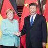 Chủ tịch Trung Quốc Tập Cận Bình (phải) và Thủ tướng Đức Angela Merkel (trái) tại cuộc gặp ở Bắc Kinh, Trung Quốc, ngày 6/9. (Ảnh: THX/TTXVN)