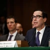 Bộ trưởng Tài chính Mỹ Steven Mnuchin - bên phải. (Ảnh: THX/TTXVN)