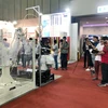 Công nghệ robot tự động hóa được các doanh nghiệp trình diễn tại triển lãm. (Ảnh: Mỹ Phương/TTXVN)