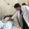 Một nữ bệnh nhân bị nhiễm toan lactic nặng đang điều trị tại Bệnh viện Thống Nhất sau khi uống viên tiểu đường hoàn bị Bộ Y tế cấm lưu hành. (Ảnh: Đinh Hằng/TTXVN)