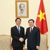 Phó Thủ tướng Vương Đình Huệ tiếp Phó Bí thư Tỉnh ủy Vân Nam của Trung Quốc Vương Dư Ba. (Ảnh: Doãn Tấn/TTXVN)
