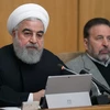 Tổng thống Iran Hassan Rouhani - bên trái. (Ảnh: AFP/TTXVN)