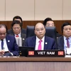 Thủ tướng Nguyễn Xuân Phúc và các thành viên Đoàn đại biểu cấp cao Chính phủ Việt Nam tham dự hội nghị. (Ảnh: Thống Nhất/TTXVN)