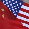 Cờ Trung Quốc và Mỹ. (Nguồn: ghanamotion)