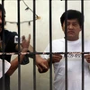 Đối tượng Andal Ampatuan Jnr (phải), nghi phạm tiến hành vụ thảm sát nhằm vào đoàn tùy tùng của ông Esmail Mangudadatu, ứng cử viên đối thủ tranh cử chức tỉnh trưởng tỉnh Maguindanao của Philippines, ngày 27/11/2009. (Ảnh: AFP/TTXVN)