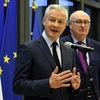 Bộ trưởng Tài chính Pháp Bruno Le Maire (trái) tại cuộc họp báo với Ủy viên thương mại châu Âu Phil Hogan (phải) ở Paris của Pháp, ngày 7/1. (Ảnh: AFP/TTXVN)