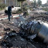 Hiện trường vụ rơi máy bay của Hãng hàng không quốc tế Ukraine tại Tehran, Iran, ngày 8/1. (Ảnh: THX/TTXVN)