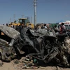 Hiện trường một vụ đánh bom tại Mogadishu của Somalia. (Ảnh: THX/TTXVN)