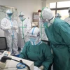 Nhân viên y tế làm việc tại bệnh viện ở thành phố Vũ Hán, tỉnh Hồ Bắc, Trung Quốc, ngày 27/10. (Ảnh: THX/TTXVN)