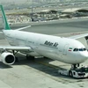 Máy bay Airbus A340 của hãng hàng không Mahan Air tại sân bay quốc tế Dubai, UAE. (Nguồn: AFP/TTXVN)