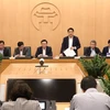 Chủ tịch UBND thành phố, Trưởng ban Chỉ đạo phòng, chống dịch COVID-19 Hà Nội Nguyễn Đức Chung phát biểu tại cuộc họp. (Ảnh: Văn Điệp/TTXVN)