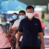 Người dân đeo khẩu trang nhằm ngăn chặn sự lây lan của dịch COVID-19 tại Jakarta, Indonesia ngày 2/3 vừa qua. (Ảnh: THX/TTXVN)
