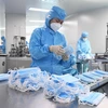 Một nhà máy sản xuất khẩu trang của Tập đoàn Y tế Naton ở Bắc Kinh, Trung Quốc, ngày 11/3 vừa qua. (Ảnh: THX/TTXVN)