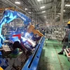 Dây chuyền sản xuất của Công ty THACO tại Khu kinh tế mở Chu Lai, tỉnh Quảng Nam. (Ảnh: Danh Lam/TTXVN)