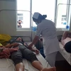 Các bệnh nhân đang được điều trị tại Bệnh viện II Lâm Đồng chiều ngày 20/7. (Ảnh: Chu Quốc Hùng/TTXVN)