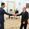 Tổng thống Syria Bashar Assad bắt tay Vladimir Putin tại Điện Kremlin, ngày 20/10/2015. (Nguồn: haaretz)