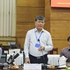 Ông Nguyễn Văn Hiếu, Phó Giám đốc Sở Giáo dục và Đào tạo Thành phố Hồ Chí Minh báo cáo tại buổi làm việc. (Ảnh: Thu Hương/TTXVN)