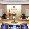 Thủ tướng Nguyễn Xuân Phúc phát biểu tại phiên họp giữa Thường trực Chính phủ với Ban Chỉ đạo phòng, chống COVID 19. (Ảnh: Thống Nhất/TTXVN)