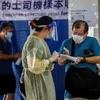 Một điểm xét nghiệm COVID-19 tại Hong Kong, Trung Quốc, ngày 19/7 vừa qua. (Ảnh: AFP/TTXVN)
