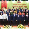 Ban Chấp hành Đảng bộ huyện Lâm Bình khóa II, nhiệm kỳ 2020-2025 chụp ảnh lưu niệm với các đại biểu. (Ảnh: Quang Cường/TTXVN)