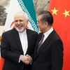 Ngoại trưởng Trung Quốc Vương Nghị và người đồng cấp Iran Mohammed Javad Zarif. (Nguồn: arabnews.jp)