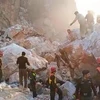 Lực lượng cứu hộ tìm kiếm nạn nhân tại hiện trường vụ sạt lở mỏ đá thuộc tỉnh Khyber Pakhtunkhwa, Tây Bắc Pakistan ngày 7/9. (Ảnh: Daily Pakistan/TTXVN)