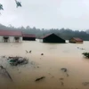 Nhiều nhà dân, thôn, bản ở xã Trường Sơn, huyện Quảng Ninh, tỉnh Quảng Bình bị ngập lụt, chia cắt cục bộ. (Ảnh: TTXVN phát)